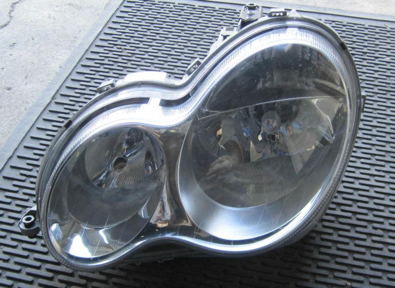 Used oem mercedes c class 12v left headlight - part # a 230 820 35 61