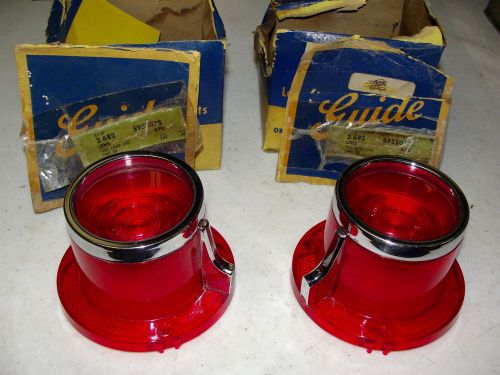 Nos 1961,pontiac bonneville 2 dr. spt. coupe, delco guide -pair, tail light lens