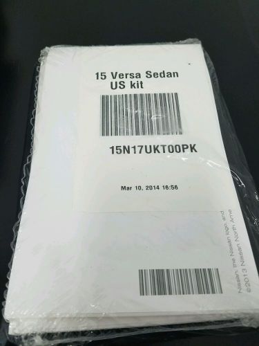 New sealed 2015 nissan versa sedan owners manual w/warranty, navigation and case