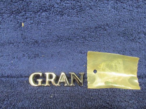 1972-76 ford gran torino  front fender emblem  nos ford  516