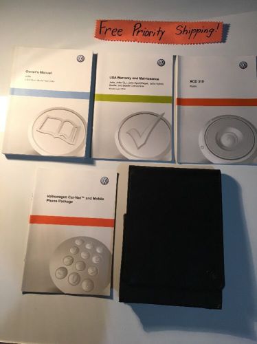 2014 volkswagen jetta owners manual w/case. # 0060 free priority shipping!