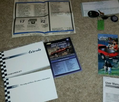 2004 chevrolet colorado owner manual set plus window sticker, keys, plus extras.