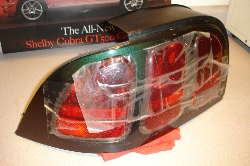 96 97 98 ford mustang driver left rear taillight assembly nos dark met green