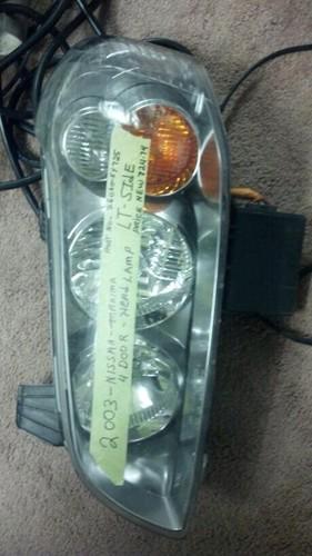 2003 nissan maxima headlight