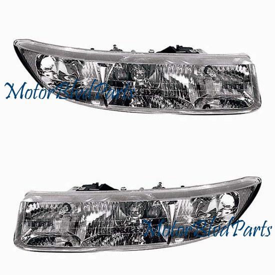 97-00 saturn s series cpe headlights driver + passenger