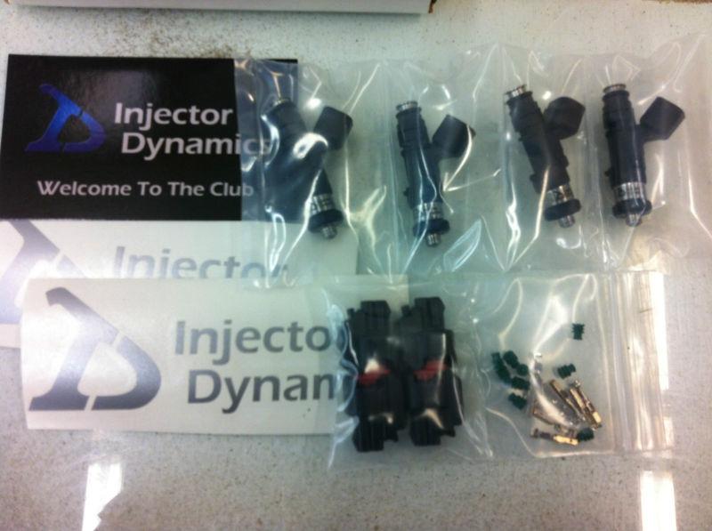 Injector dynamics 1000cc top feed subaru injectors -- set of 4 id1000