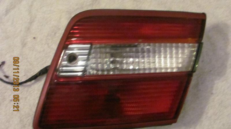 97 98 infiniti q45 & q45t passenger side / rh trunk lid tail light assembly