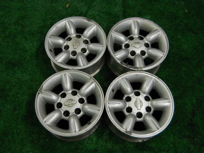 Four nissan frontier  oem 15"  wheels rims factory 6 lugs big hub 2001-2004