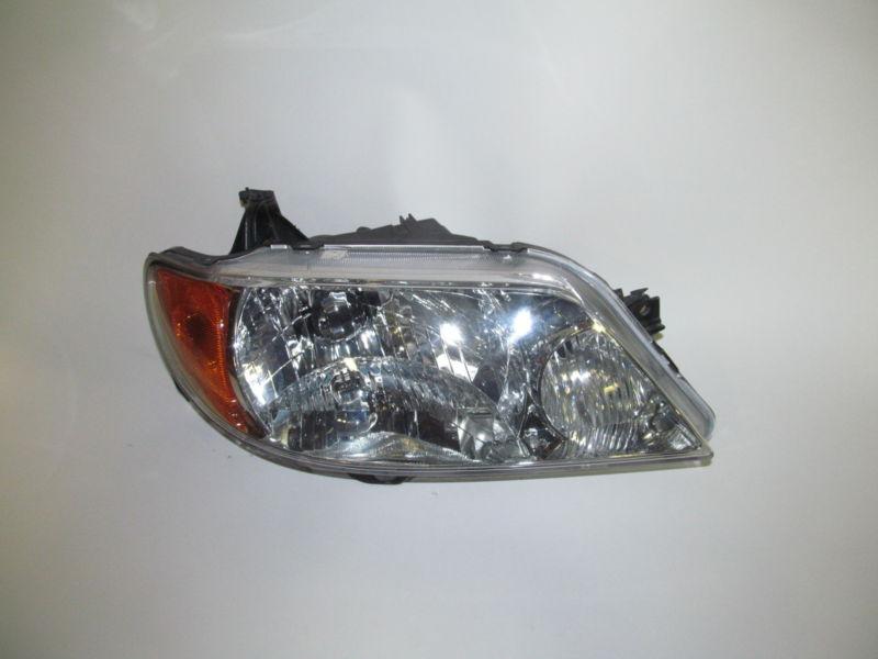 01 02 03 mazda protege oem right headlight nice!