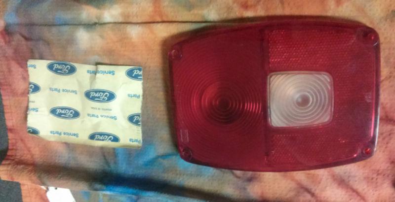 Fomoco c7tz-13450-d tail light lens nos