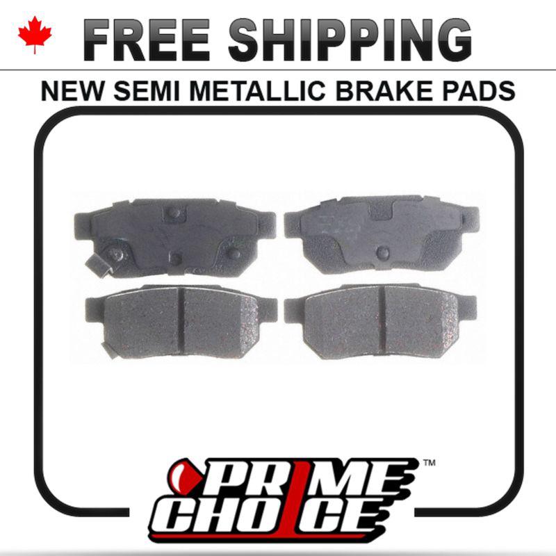 New premium complete set of rear metallic disc brake pads with shims