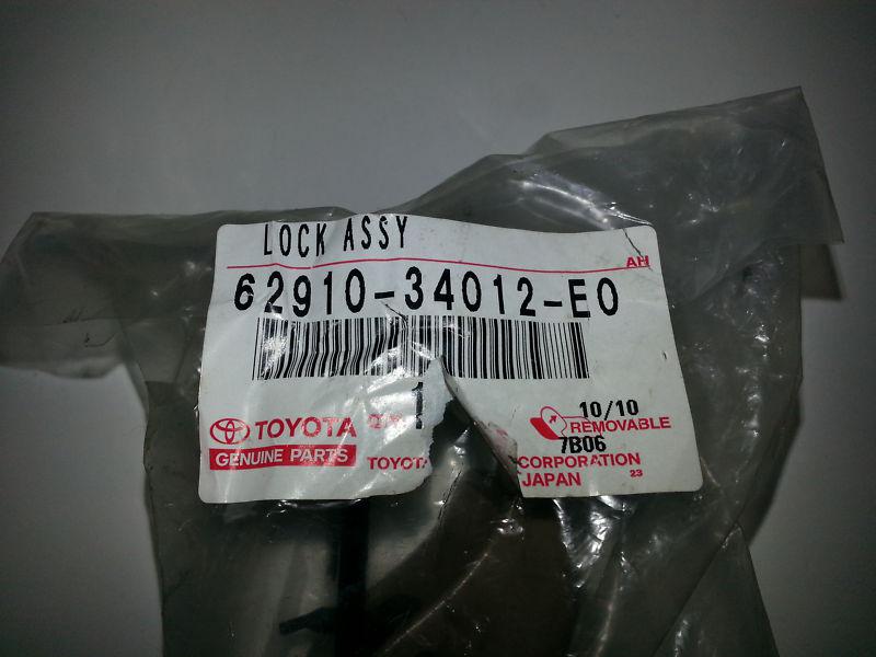 69210-34012-e0 toyota tundra quarter window lock  new oem