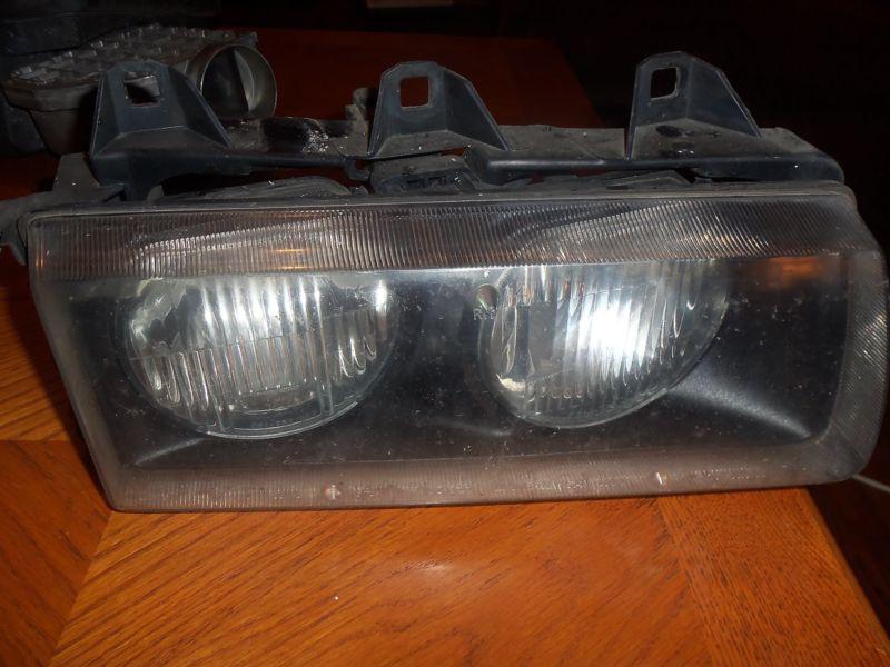 1994 bmw 318i right passenger headlight