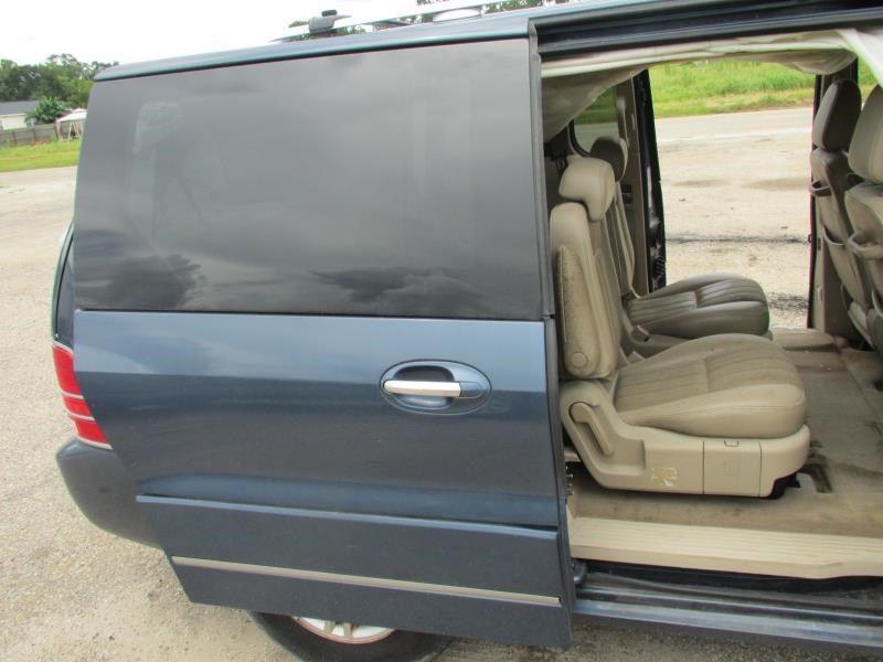 04 05 freestar r. rear side door w/power slider privacy glass w/lower cladding