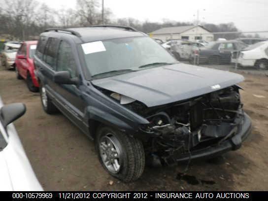 99 00 01 02 03 04 jeep grand cherokee l. headlight 551970