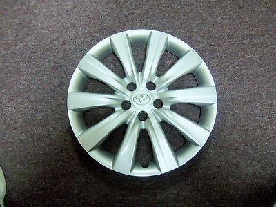 Toyota corolla oem wheel cover excellent used condition & free shipping in usa