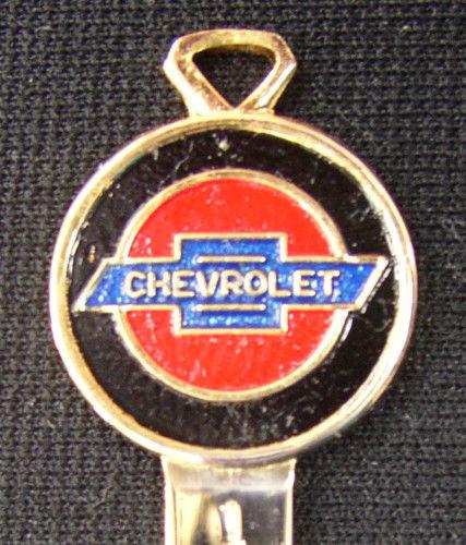 Rare b-10 chevrolet yellow gold crest key vintage bow tie chevy nos key 