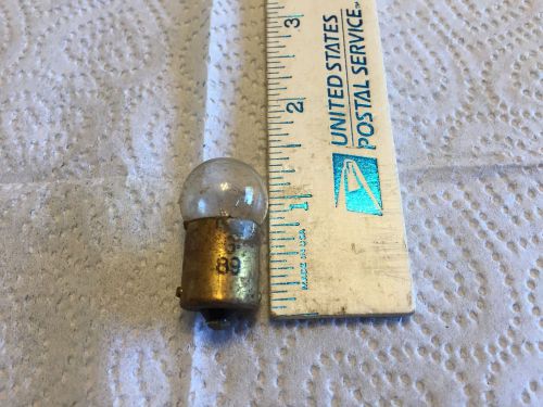 Ford; chrysler; gm; studebaker; old car light bulb,   pn 89.   item:  0062