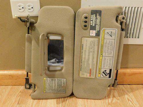 97-04 infiniti qx4 sun visor driver &amp; passenger w/homelink beige