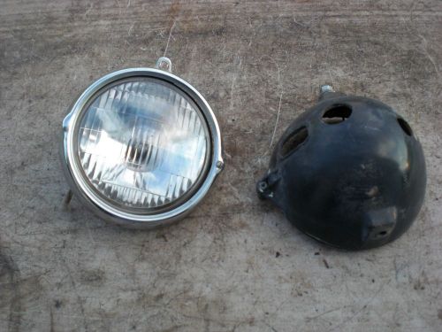 1975 honda xl100 xl 100 head light shell and chrome ring.