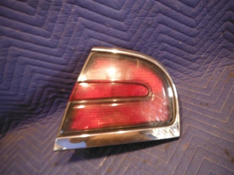 98 99 00 01 02 03 04 park avenue r. tail light qtr mtd