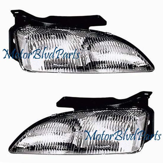 95-99 chevy cavalier headlights headlamps lh+rh set 2pc