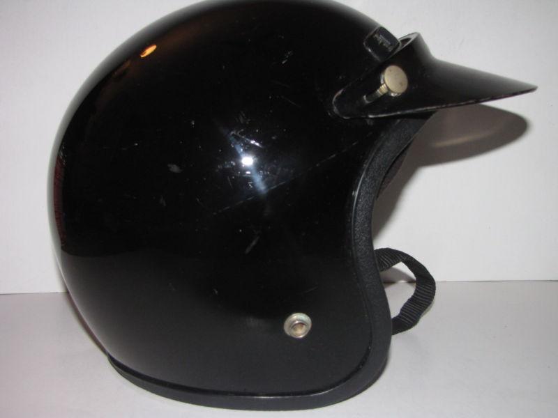 Vintage motorcycle helmet black bobber style with visor