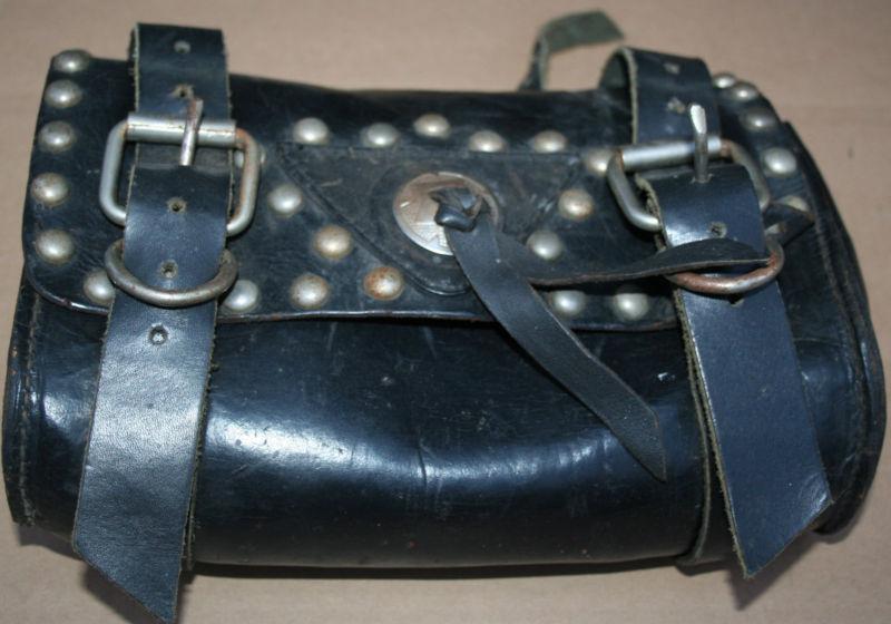 Used black leather with conchoe with buttons and buckles all attached 