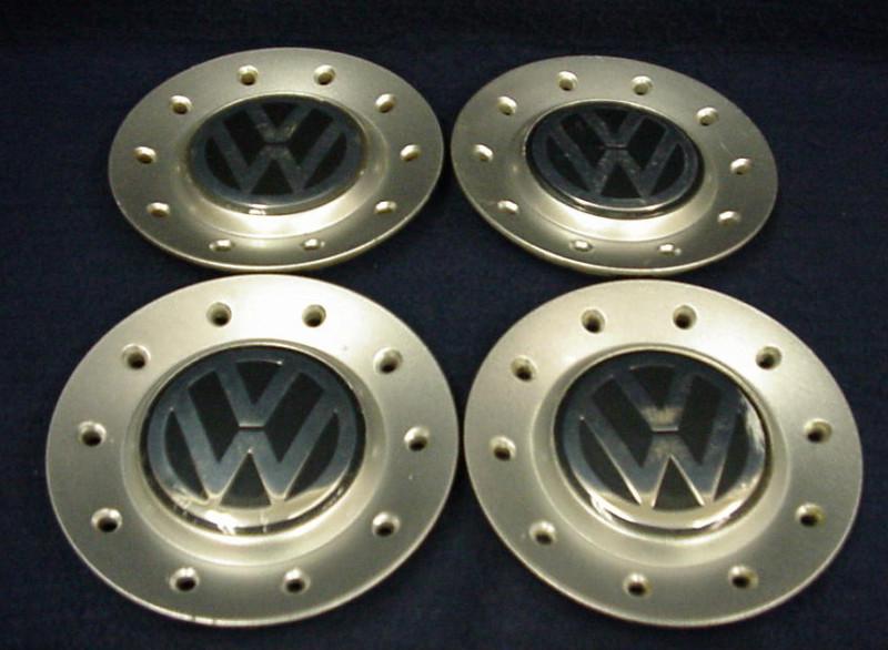 Volkswagen passat 98-01 silver center caps - set 4 - fits the 15" 5 spoke wheel 