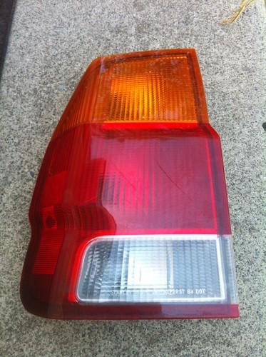 1997-1999 mitsubishi montero sport lh driver side tail light oem