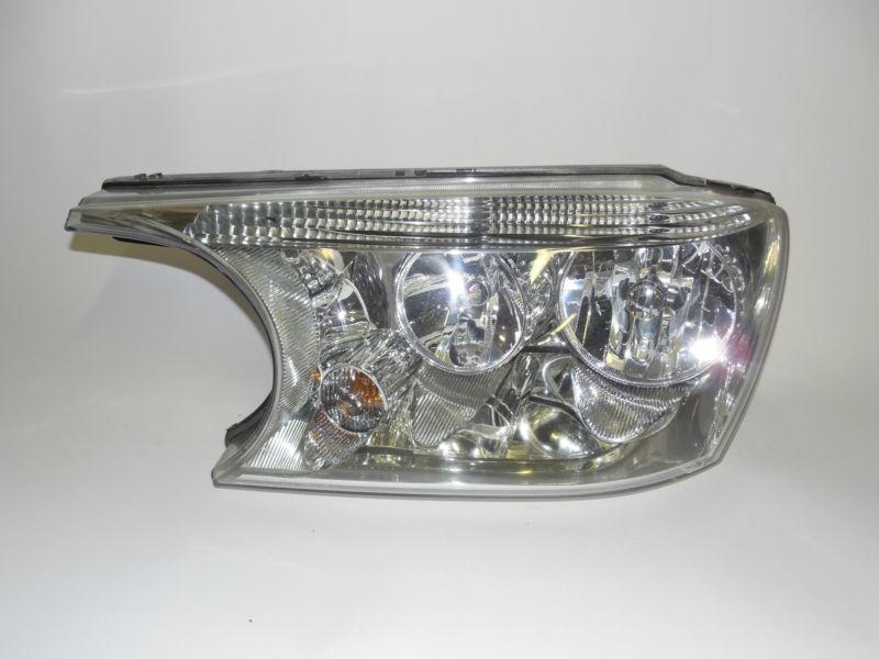 04 05 06 buick raineer oem left headlight nice!