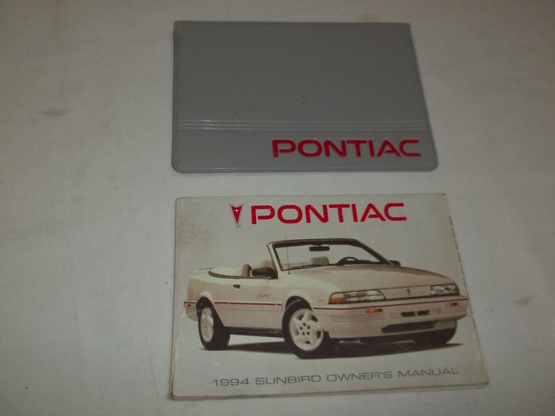 1994 pontiac sunbird owner manual 2/pc.set & gray pontiac factory case. free s