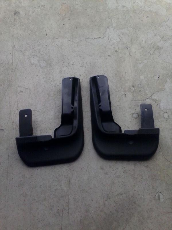 Volkswagen new  beetle and/or beetle cabriolet mud flaps.  fits 2006.