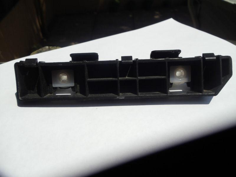 Hyndai accent 06,07,08,09 and 2010 rear bumper bracket...left hand side...used