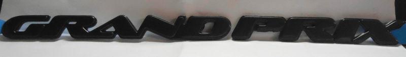 New oem gm "grand prix" nameplate fits l /r fr door 1997-03 # 89045569 8904-5569