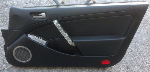 2003-2004 infiniti g35 coupe passenger side door panel black color