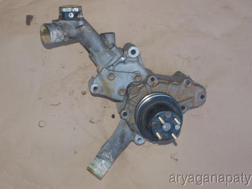 86-91 mazda rx7 oem rotary engine motor water pump  and housing b13 fc 