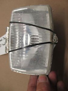 Kawasaki prairie 300 4x4 1999 front headlight