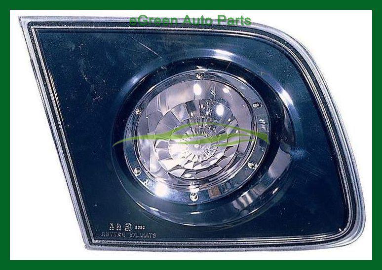 04-06 3 hatchback back-up light lamp left driver