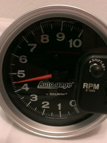 Auto gage 5 inch tachometer by auto meter with shift light 10,000 rpm