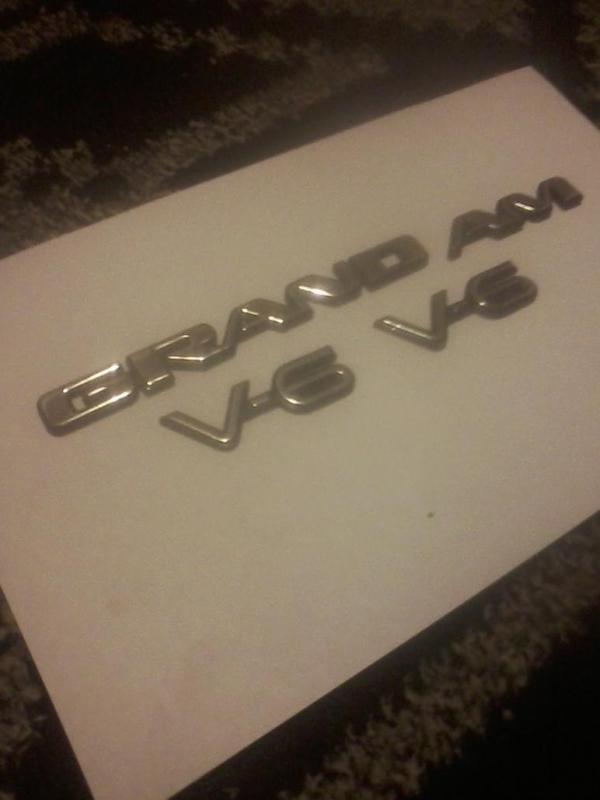 1997 pontiac grand am & v6 emblems nice chrome original parts like new