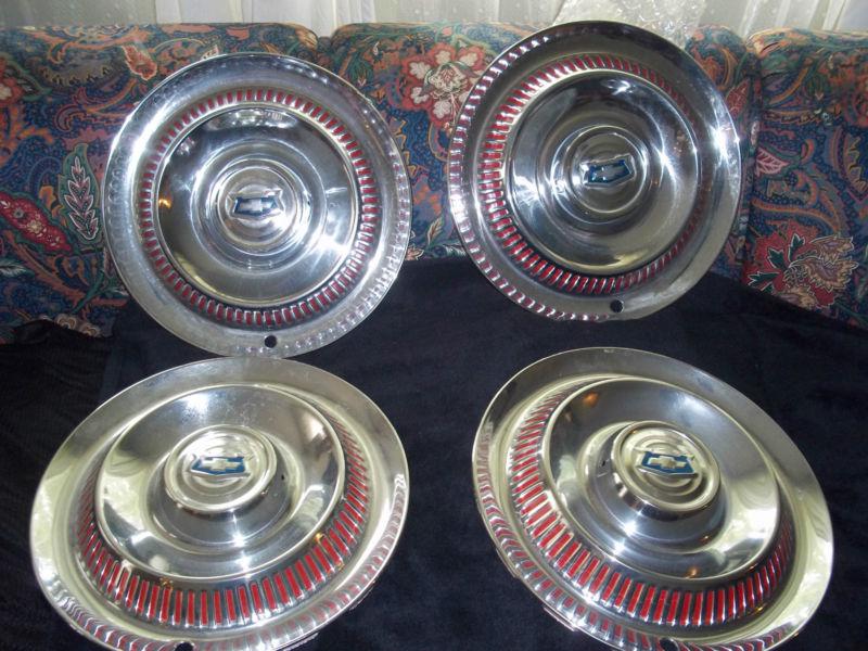 1953-1955 corvette hubcaps (original), (4) - excellent or nos