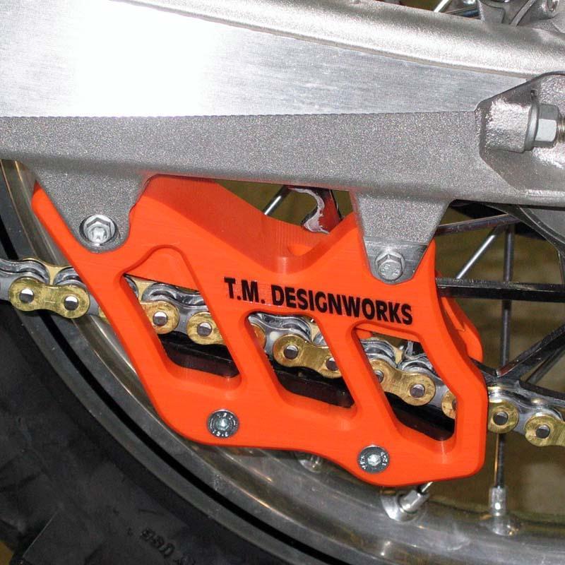 T.m. designworks factory edition 2 rear chain guide - orange  rcg-kt3-or