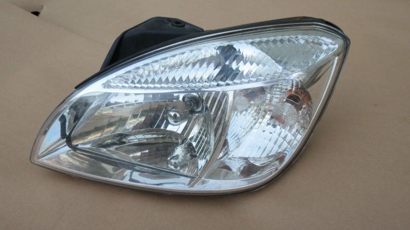 06-08 kia rio headlight driver side oem