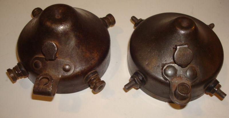Two vintage metal magneto end caps