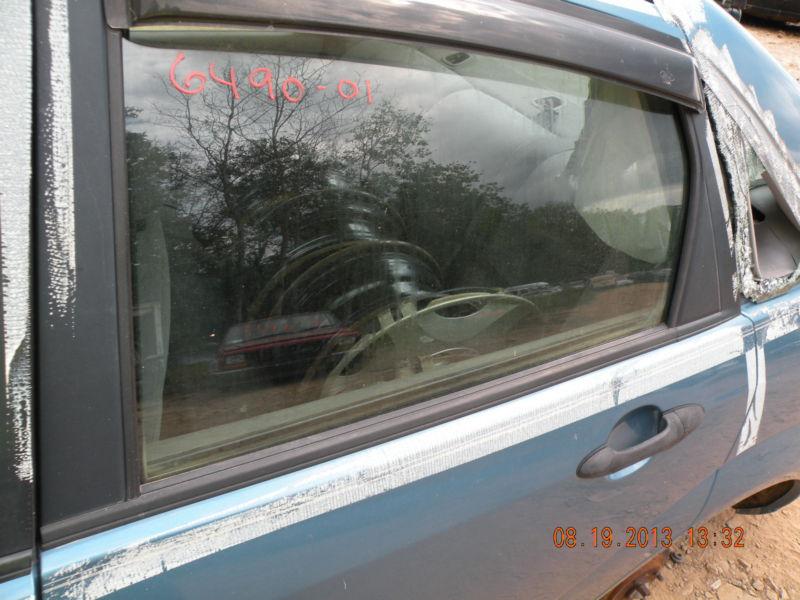 2001 focus left  rear door glass tinted 196759