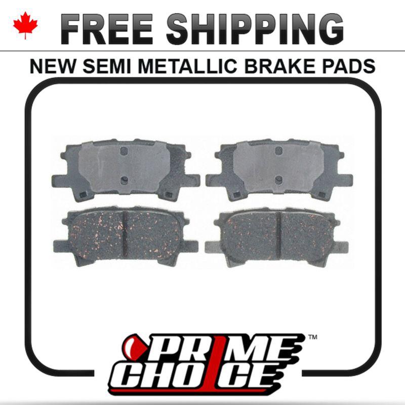 New premium complete set of rear metallic disc brake pads with shims