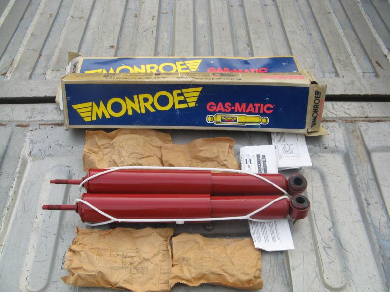 One pair (2),  monroe 5803 left & right rear sensa trac shock red nos