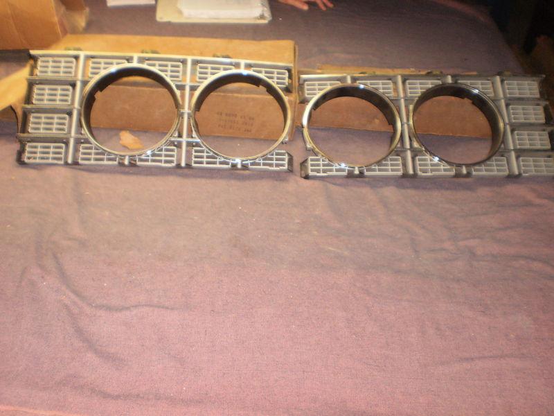 Ford 73 fullsize headlamp doors pair orig. ford nos