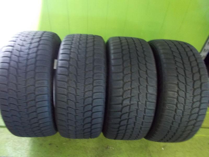 Set of (4) bridgestone blizzak lm-25 tires 245/45/18 tread 7.5-8.5/32  free ship